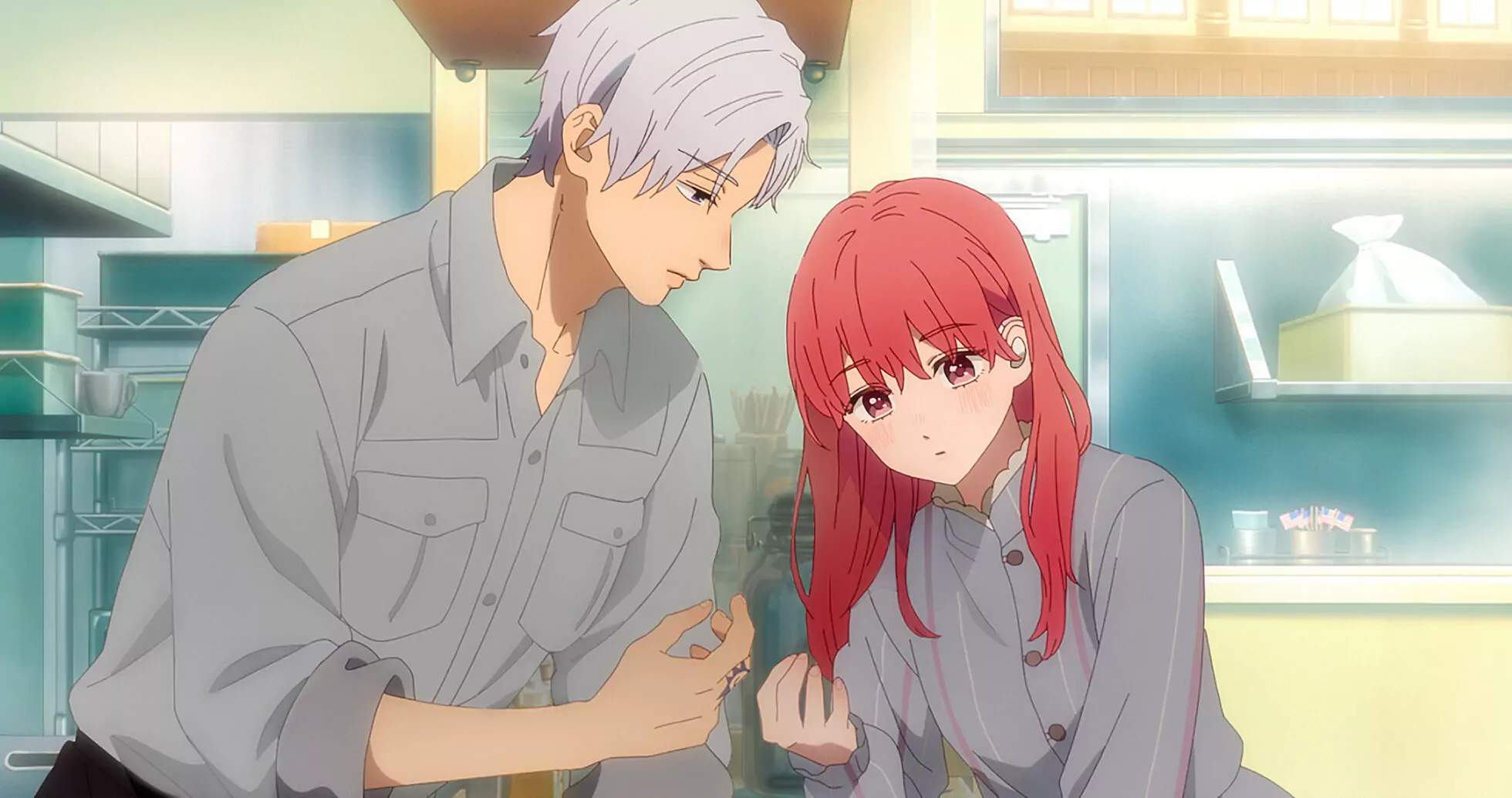 A sweet moment in the kitchen between Itsuomi and Yuki from the anime A Sign of Affection.