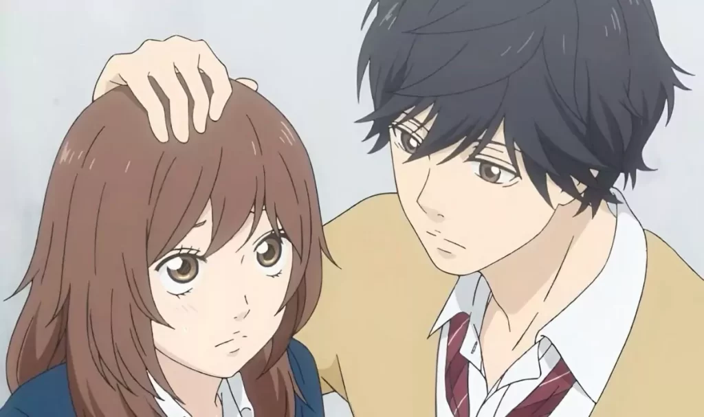 Futaba and Kou sharing a tender moment as Kou gently places his hand on Futaba’s head in the anime Ao Haru Ride