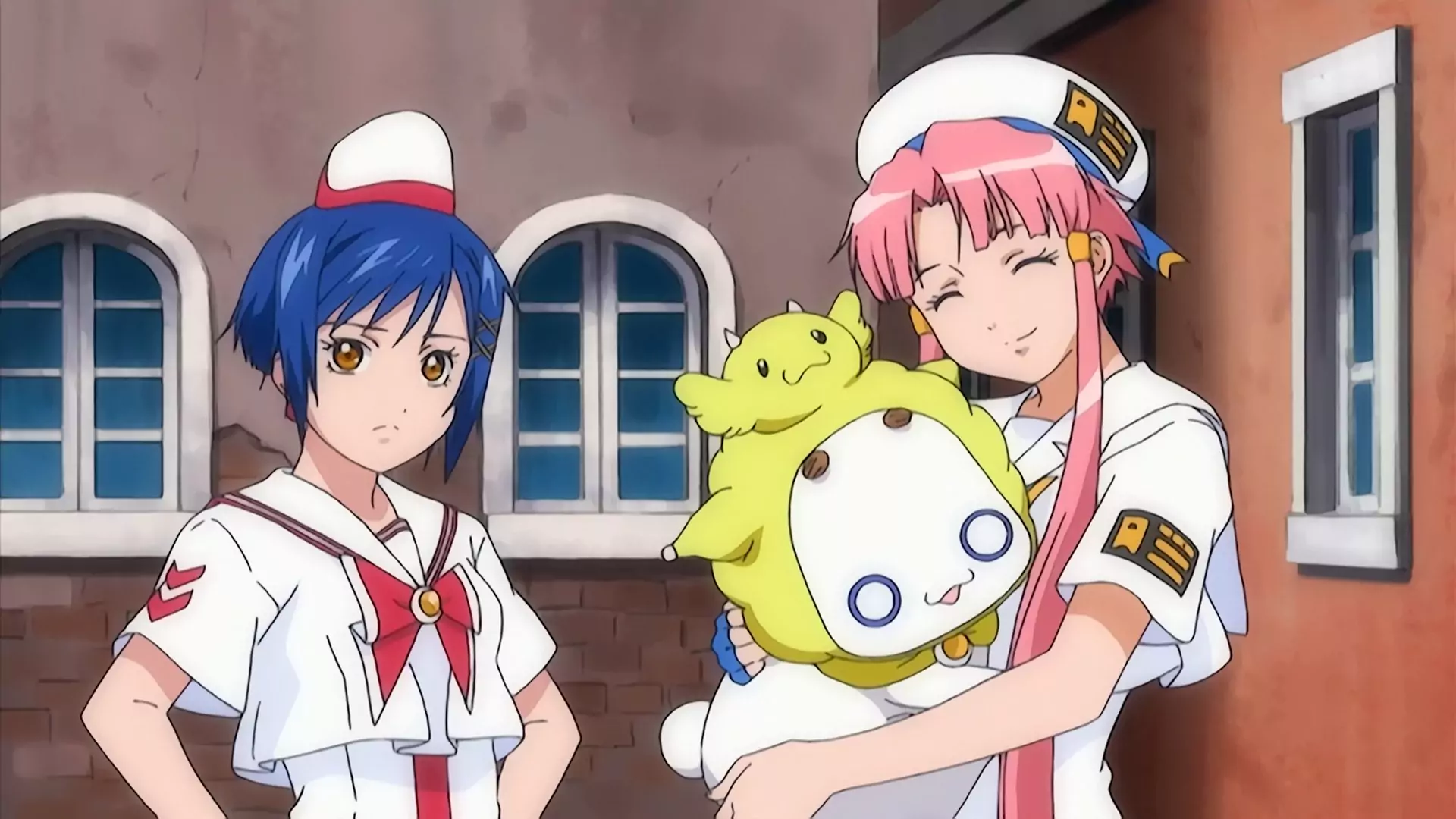 Akari holds a plush toy with a cheerful smile, while Aika appears serious in their gondolier uniforms in Aria the Animation.