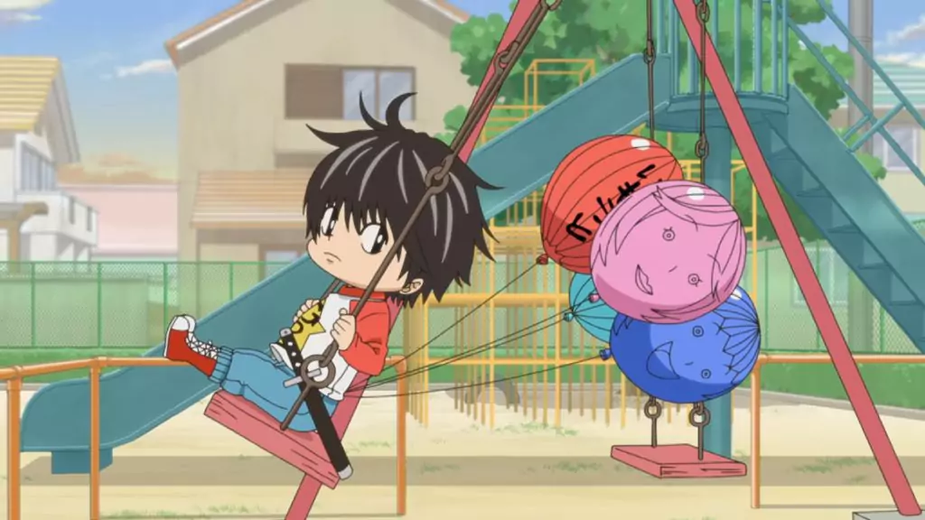 Kotaro swings at the park, looking contemplative as colorful balloons with faces hang beside him on the swings.