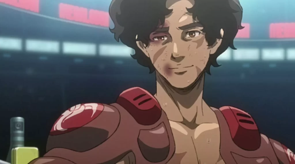 Joe smiling with cuts and bruises after a hard-fought boxing match in the Megalo Box anime