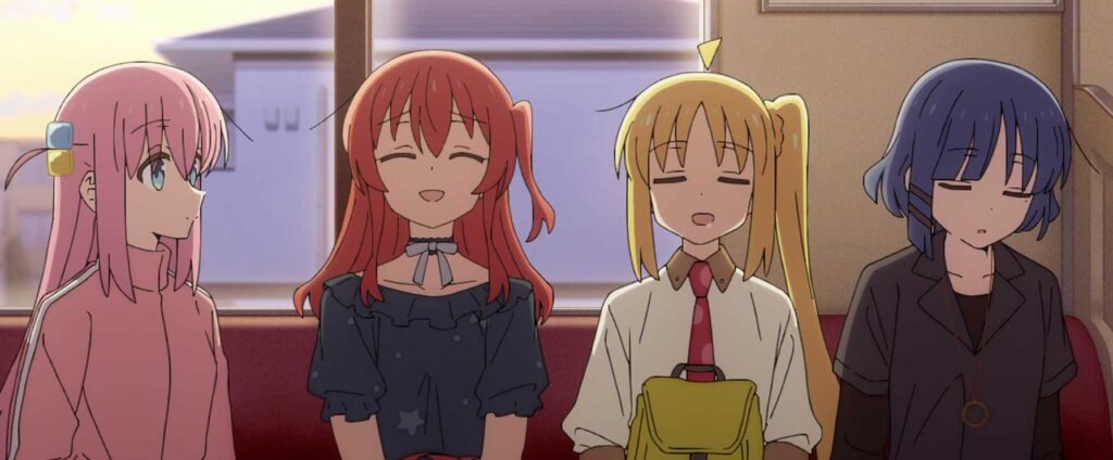 Band members from Bocchi the Rock! sitting quietly on a train, showing a peaceful moment between friends.