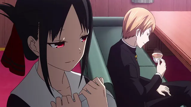 Kaguya Shinomiya smirks slyly while Miyuki Shirogane calmly sips tea, main characters from one of the best rom-com anime, Kaguya-sama: Love is War.
