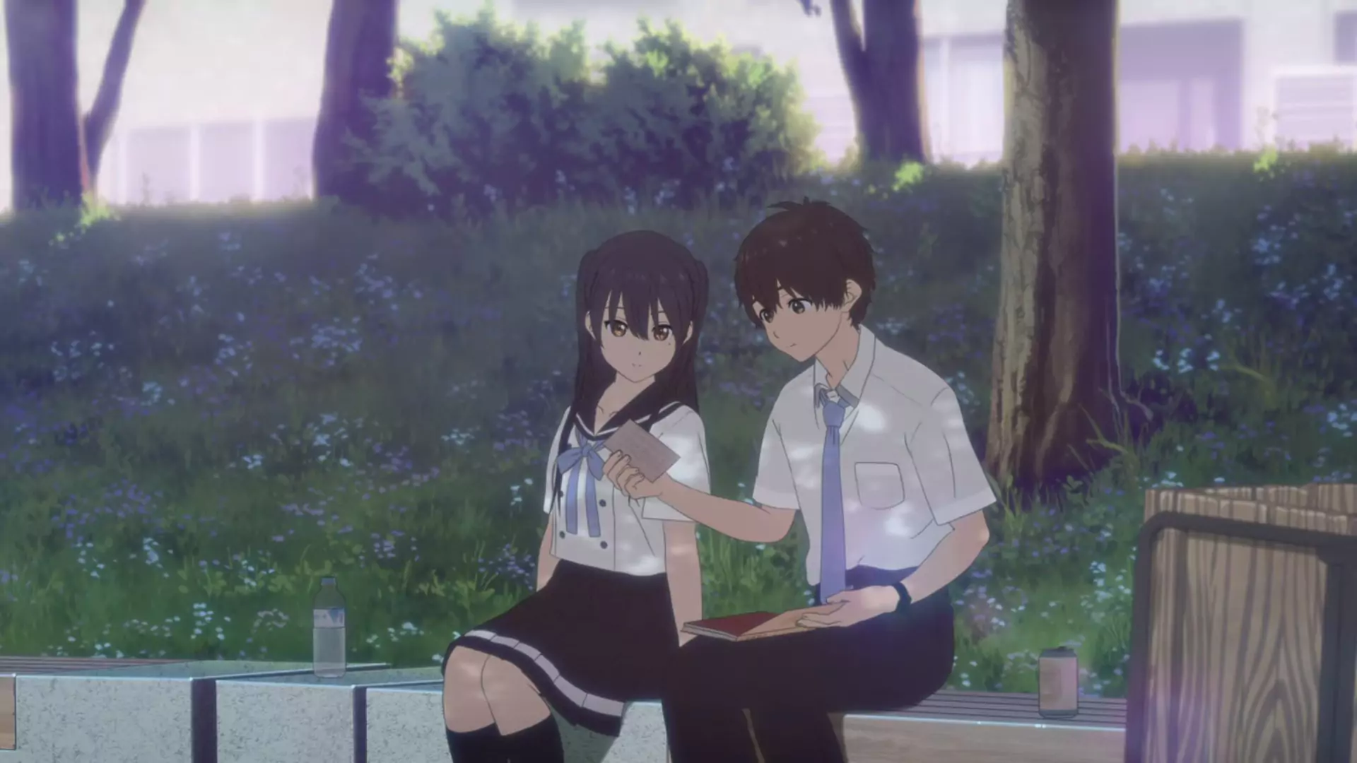 Naomi and Ruri sit together on a park bench from anime film, Hello World